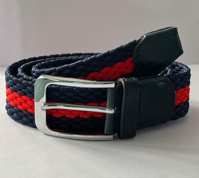 Navy and red woven belt with a silver buckle on a light gray background
